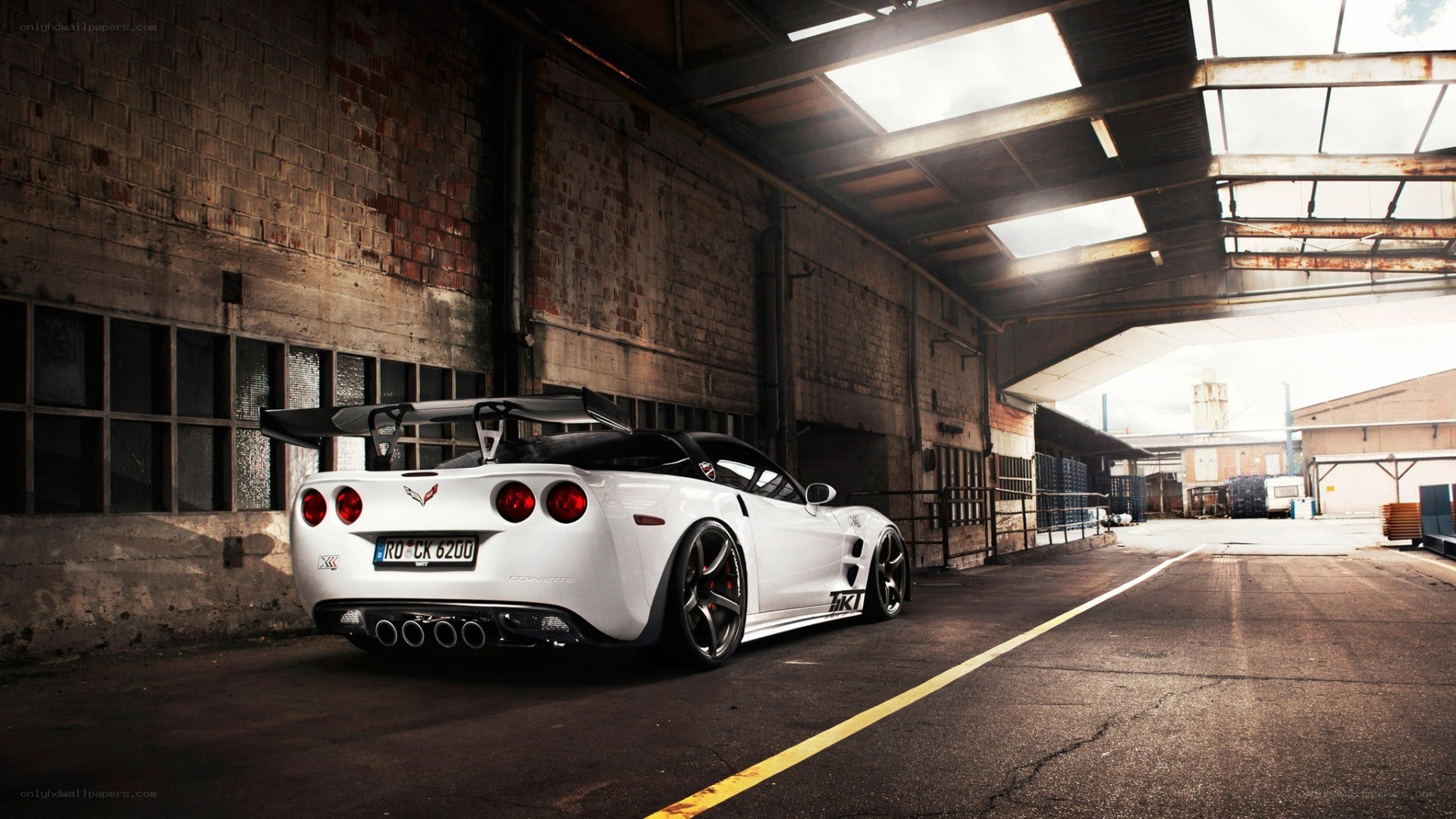white corvette in warehouse