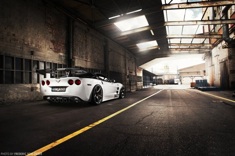 White Corvette in Warehouse — Dramatic