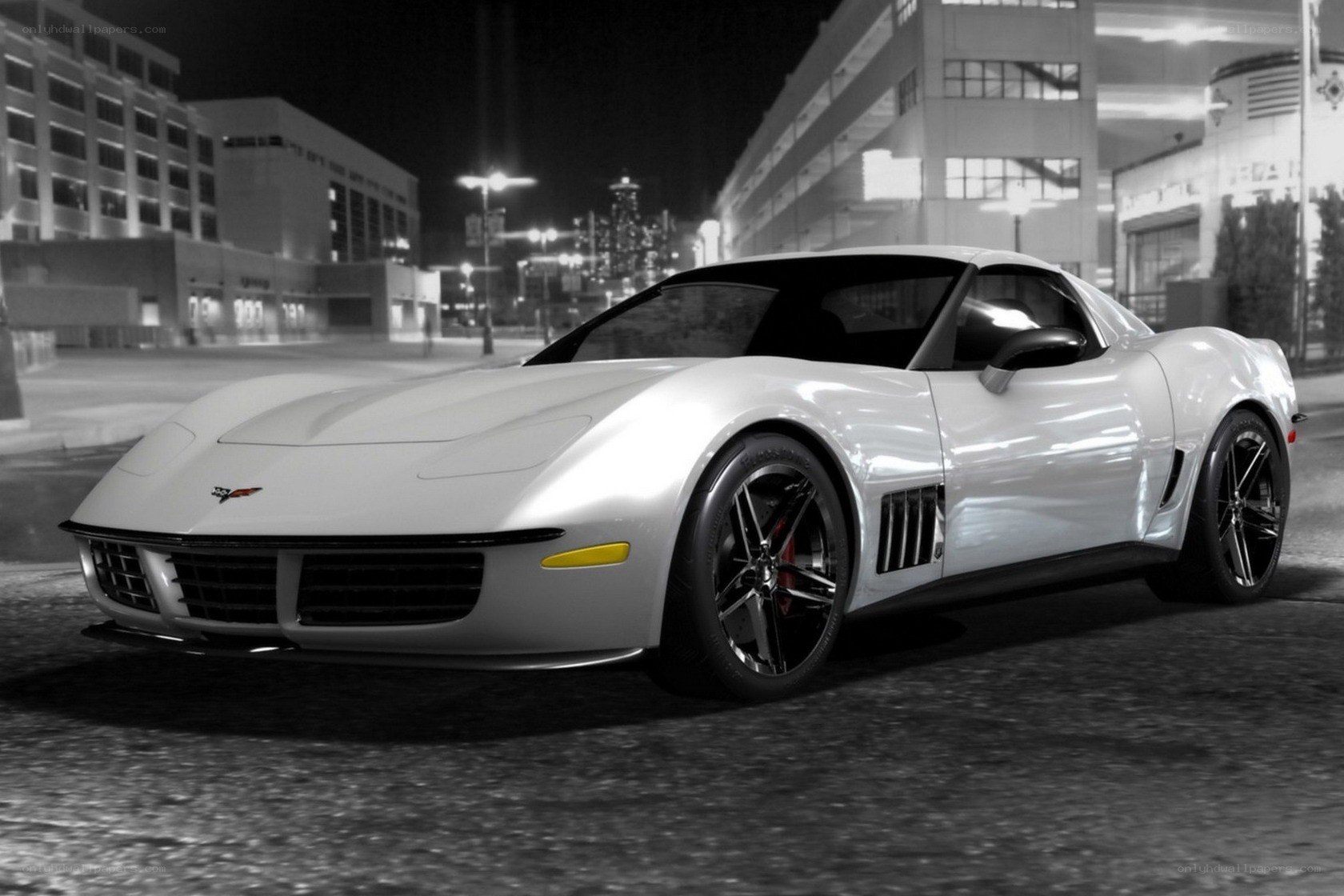 white corvette on city street