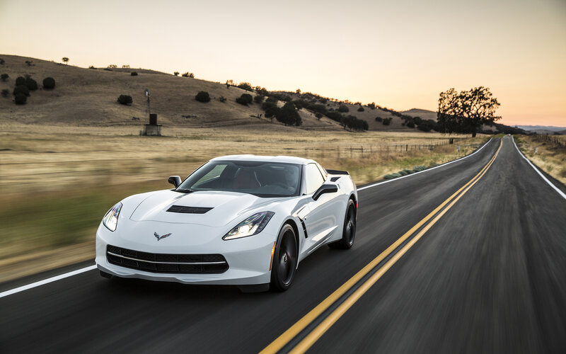 White Corvette on Road — Serene