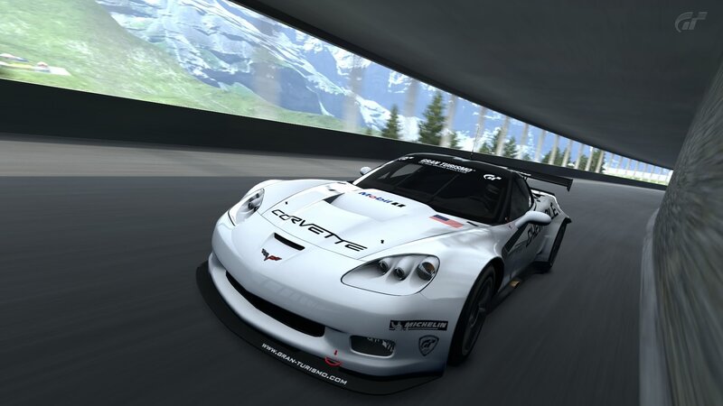 white corvette racing on track