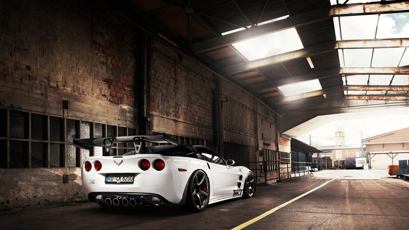 White Corvette Sports Car — Dramatic, Afternoon, Photograph, Tunnel, Brick Wall