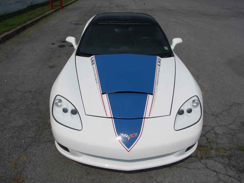 white corvette with blue stripes