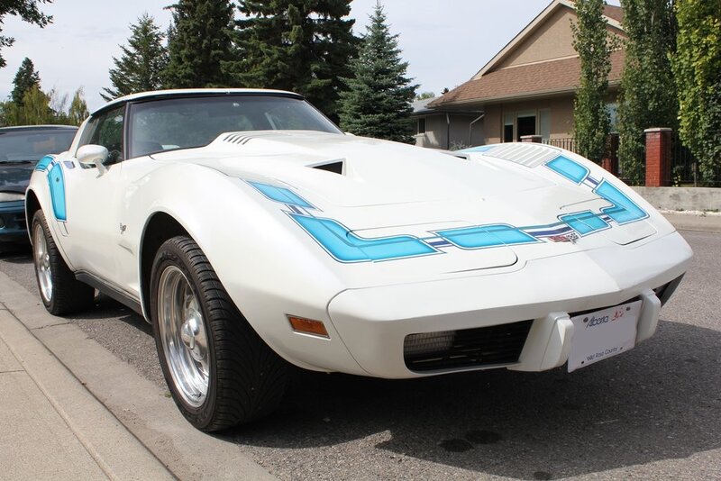 White Corvette with blue stripes