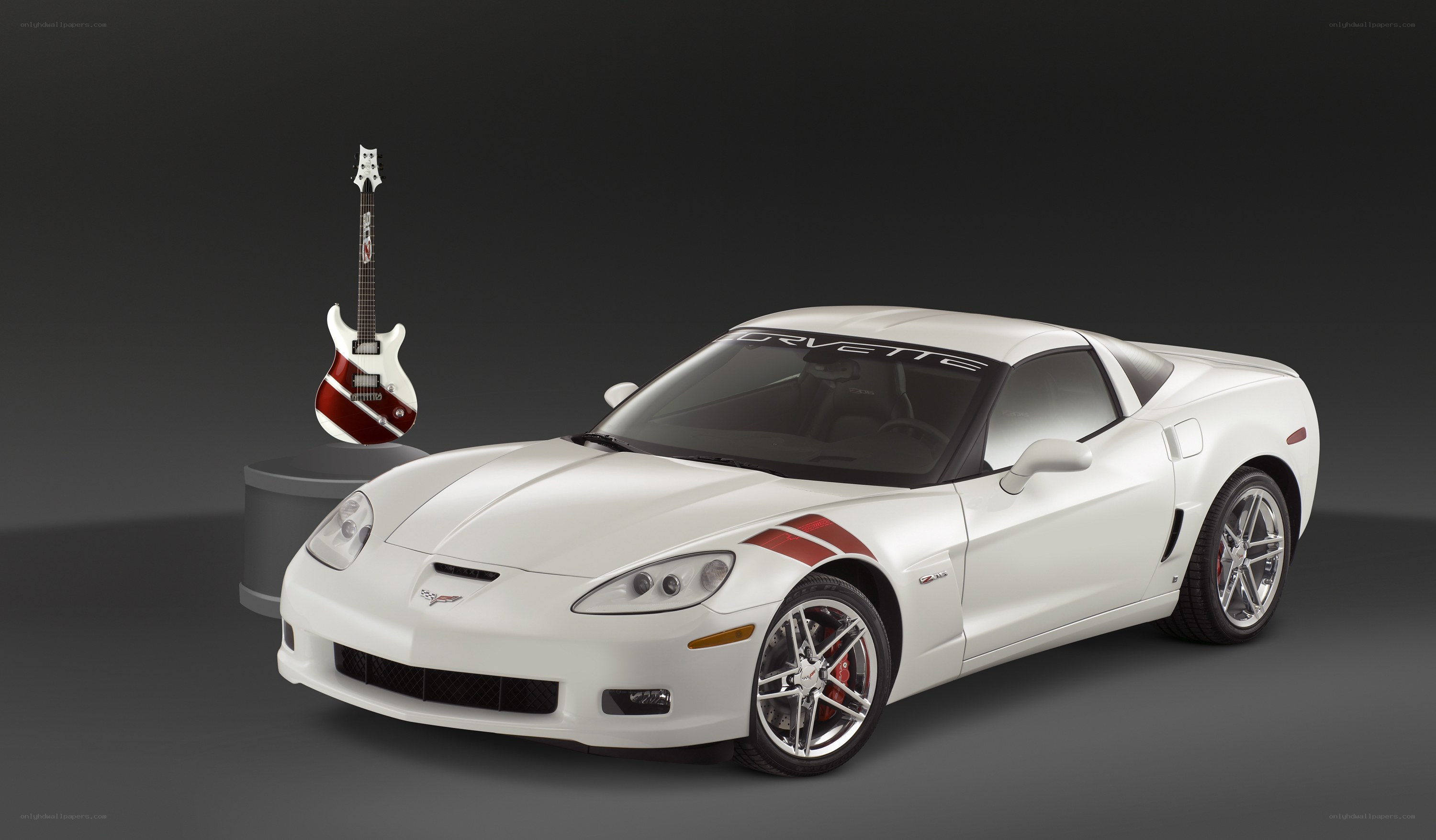 White Corvette with guitar