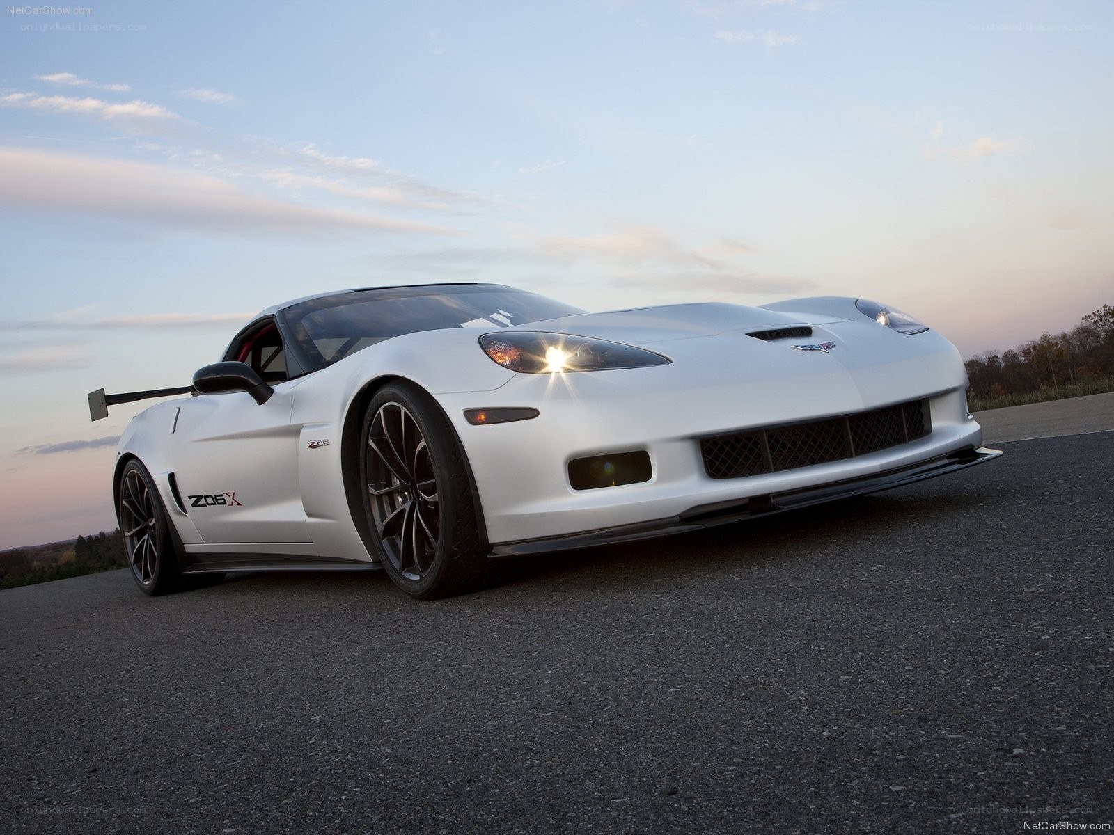 White Corvette Z06 X on a track