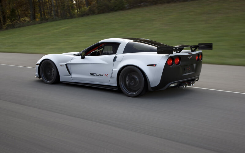 White Corvette Z06X on a racetrack
