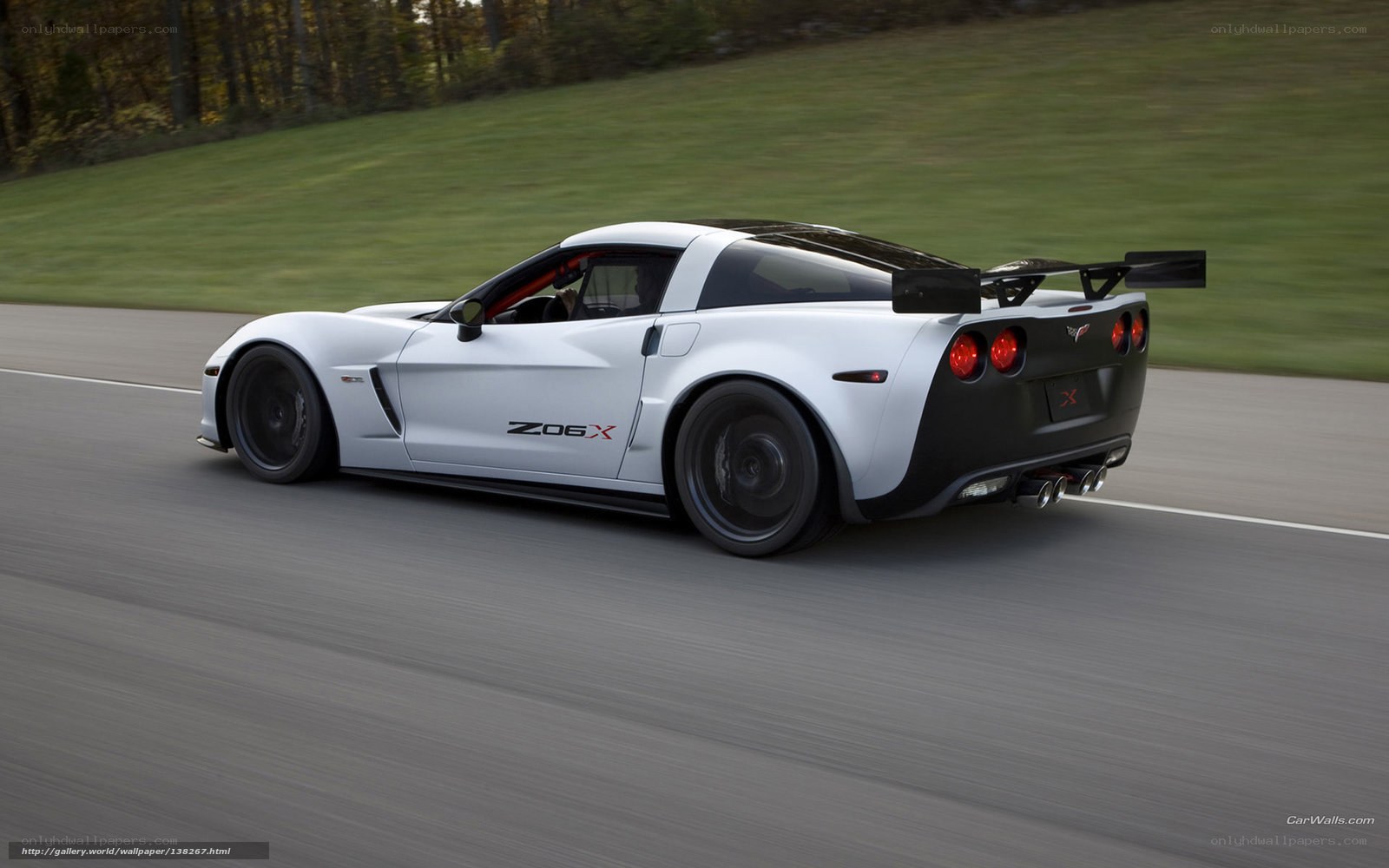 White Corvette Z06X on a road
