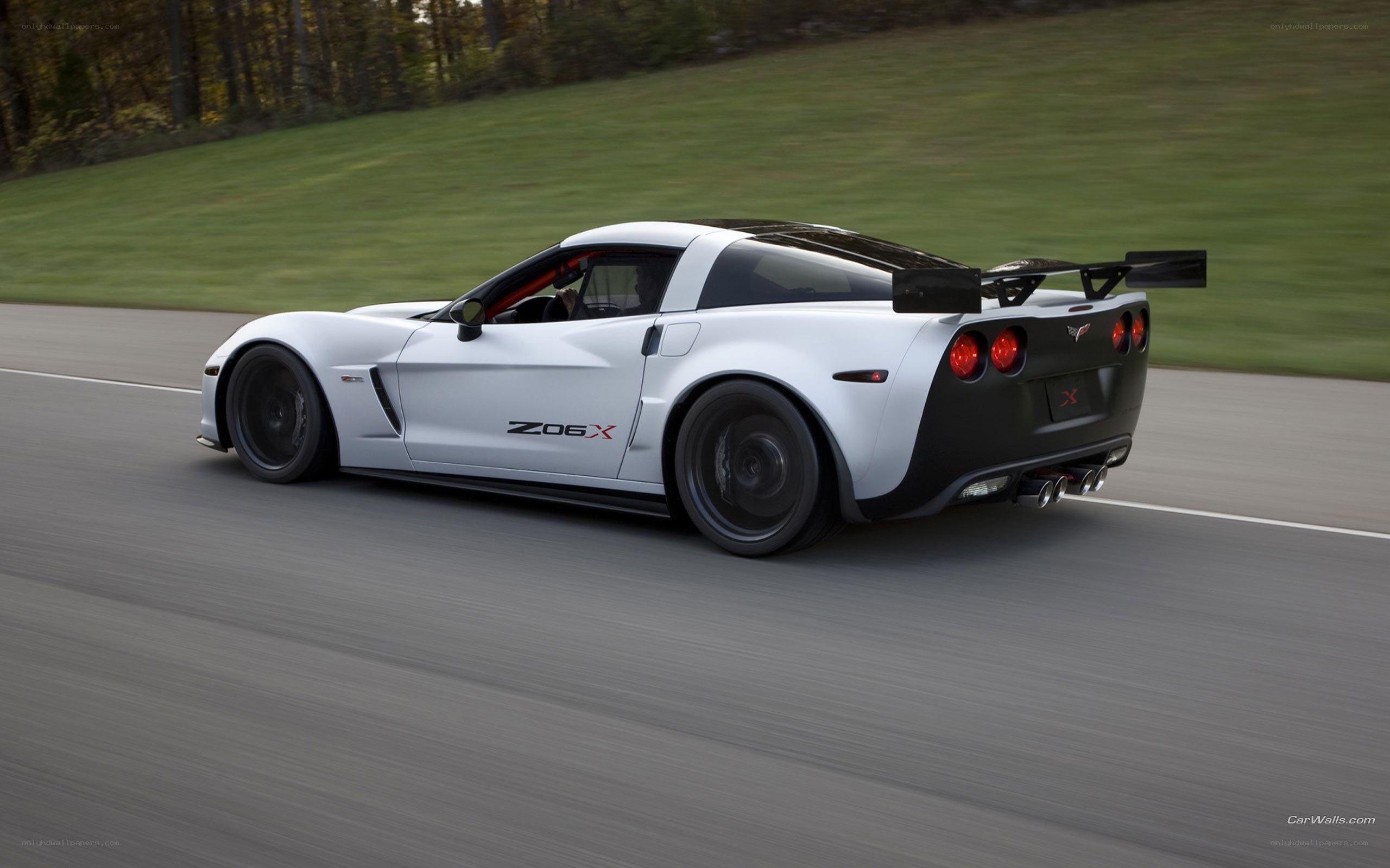 white corvette z06x on track