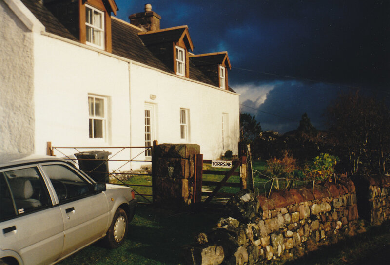 White cottage at dusk