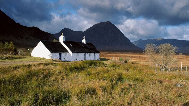 White Cottage in Field