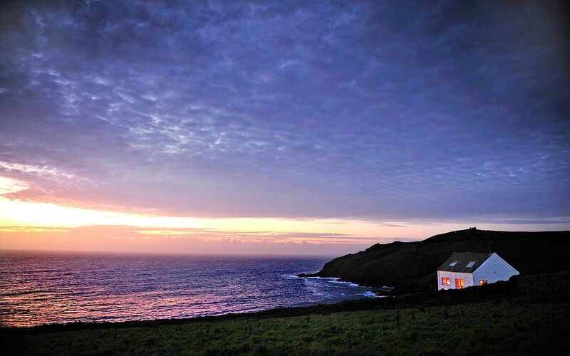White Cottage on Cliff