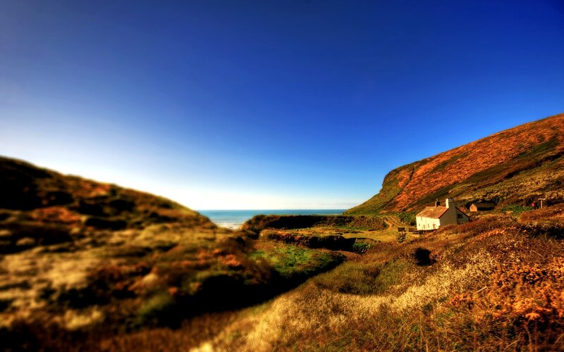 White Cottage on Hillside