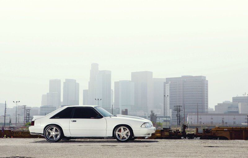 White Coupe Car — Hazy