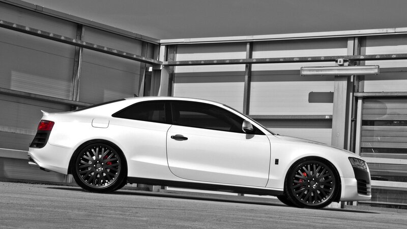 white coupe car in black and white