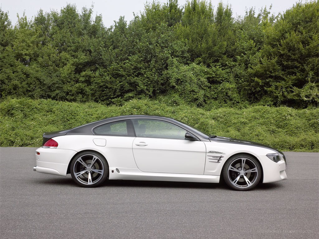 white coupe car on asphalt