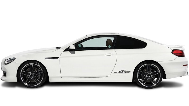 white coupe car side view