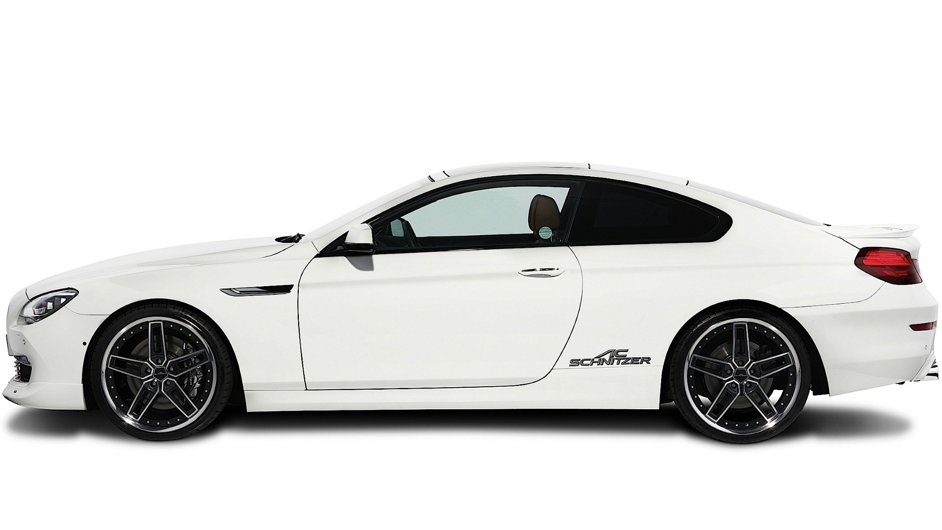 white coupe car side view