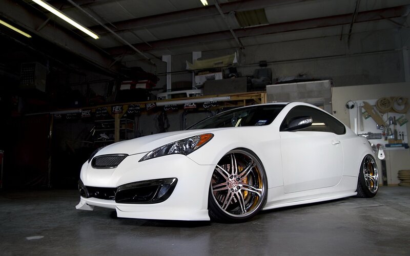 white coupe in garage
