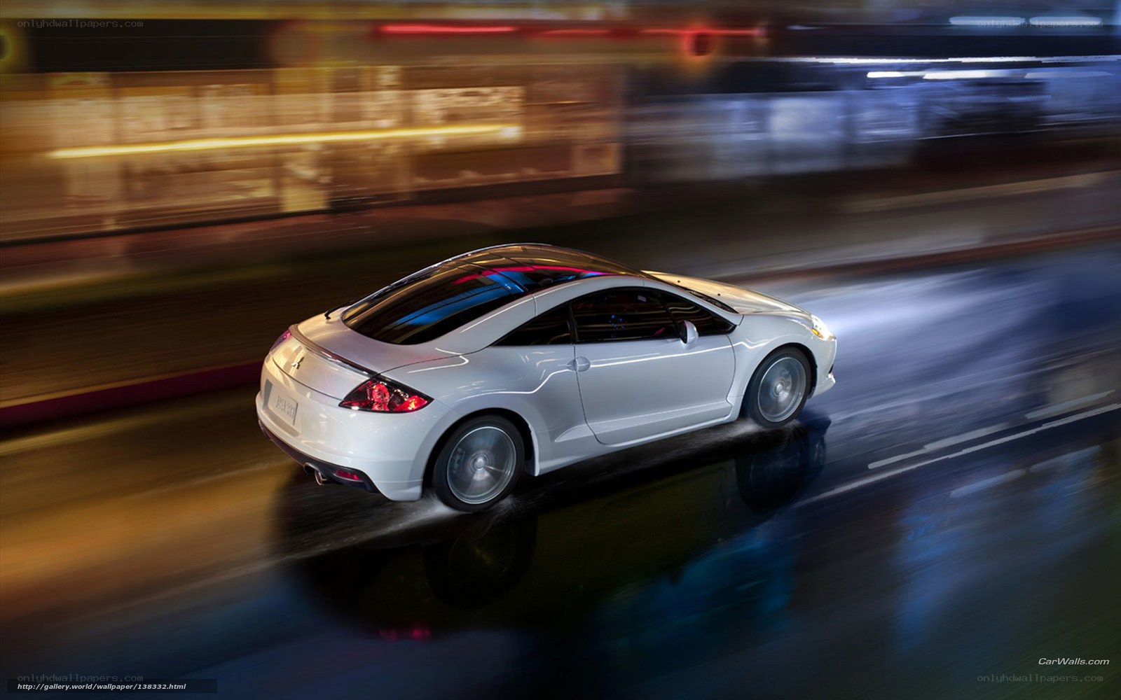 White coupe in motion at night
