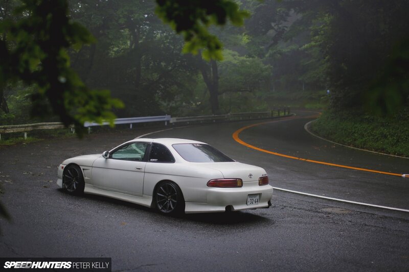 White Coupe on Road