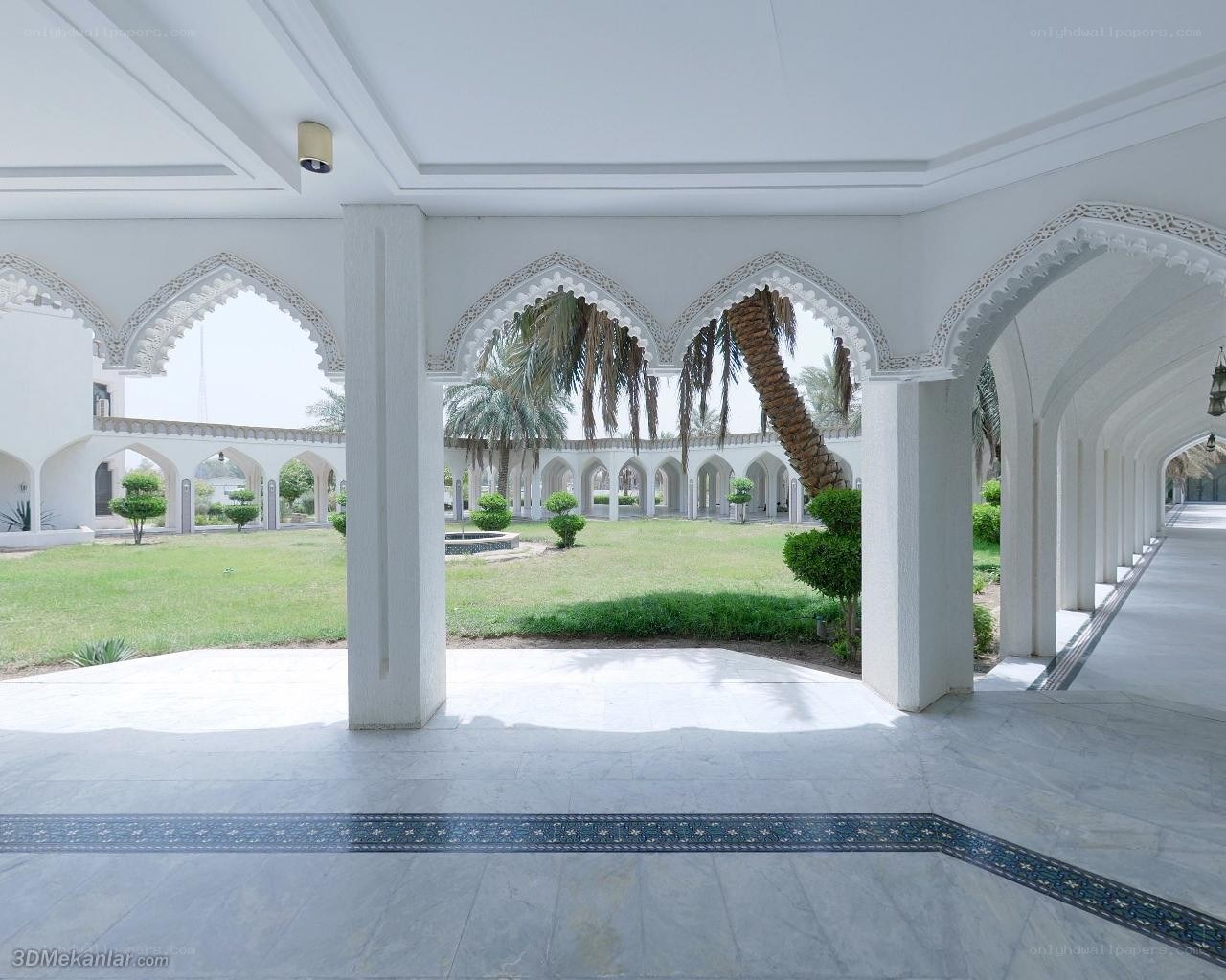 White courtyard with arches