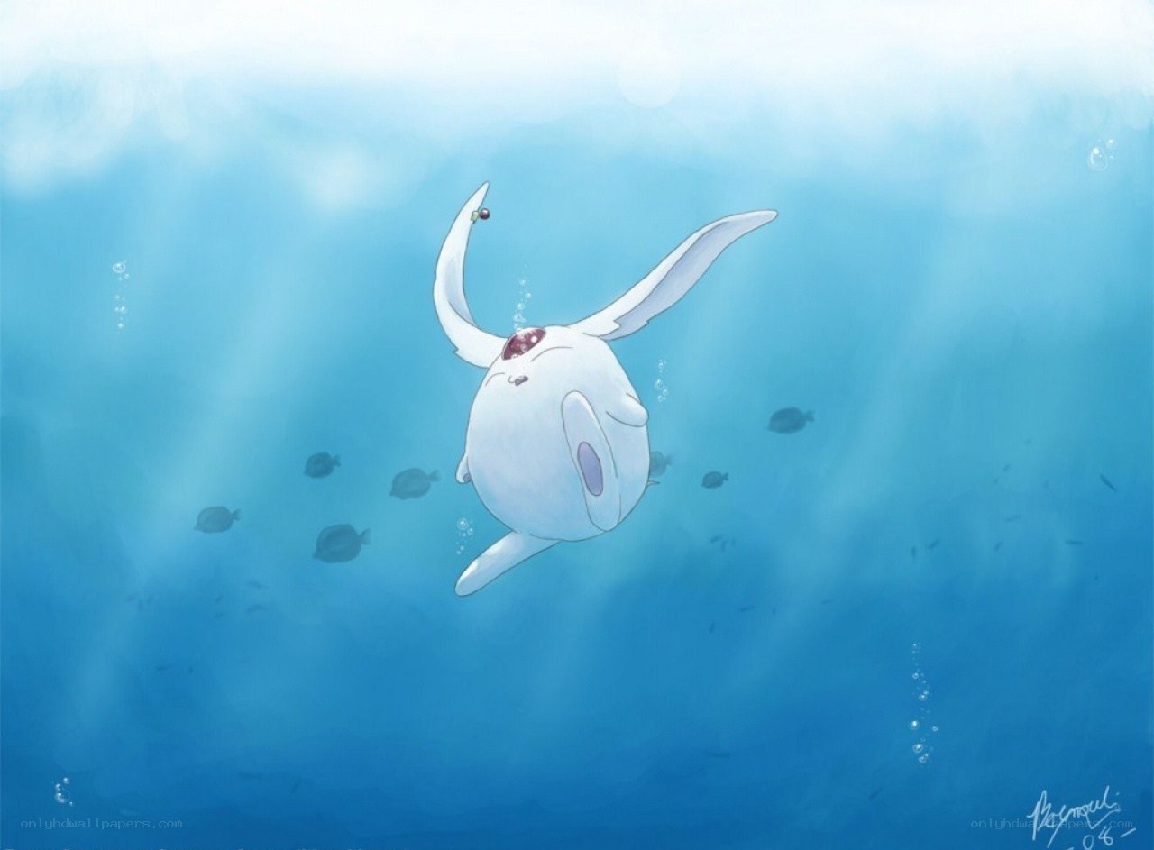 white creature swimming underwater