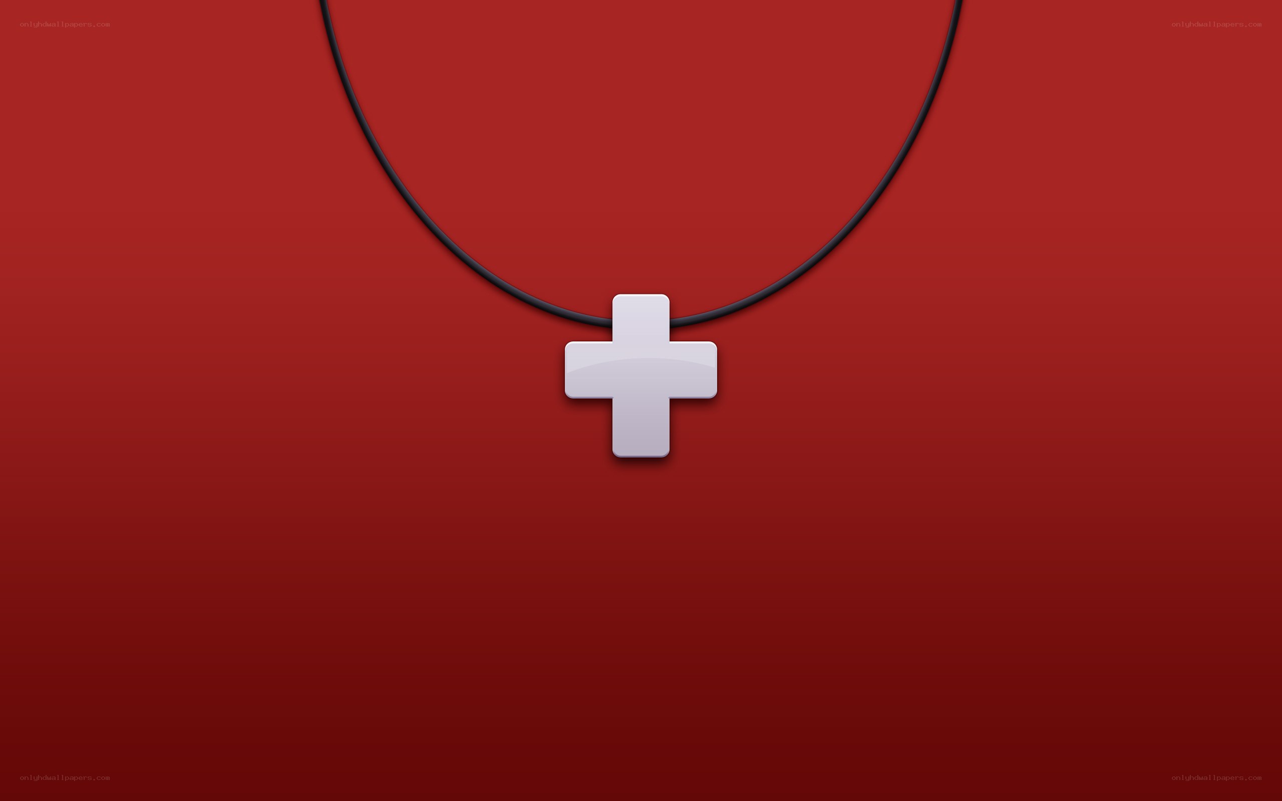 white cross pendant on red