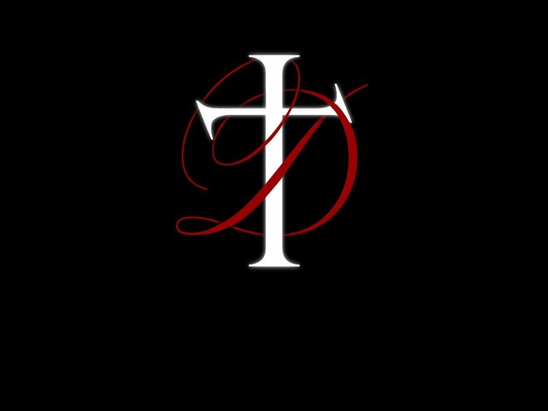 White Cross with Red Swirl — Black