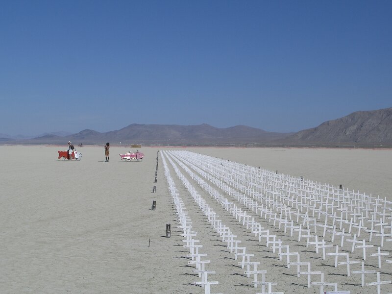 White crosses in desert landscape