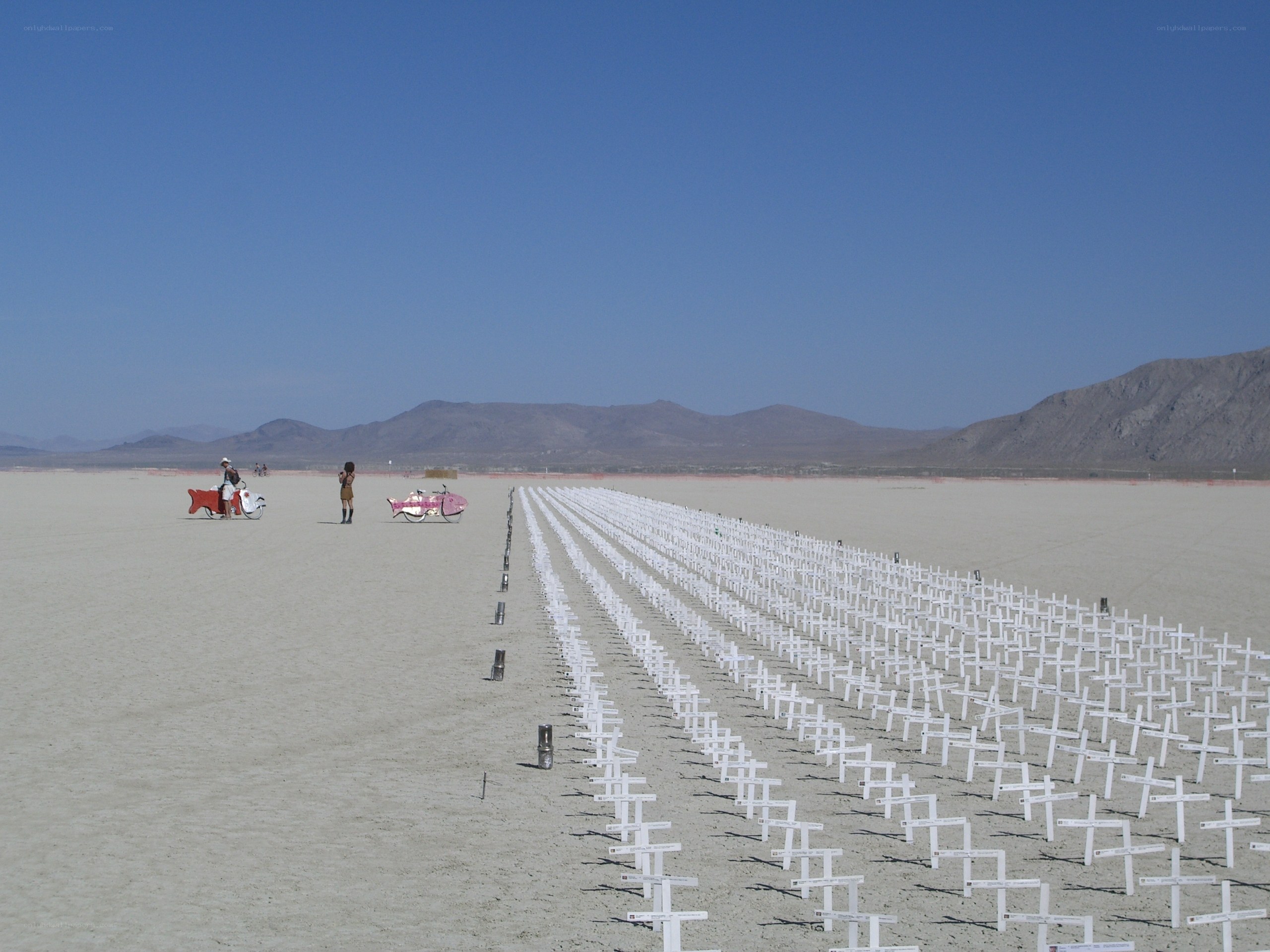 White crosses in desert landscape