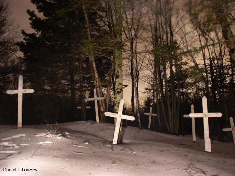 White crosses in snowy forest