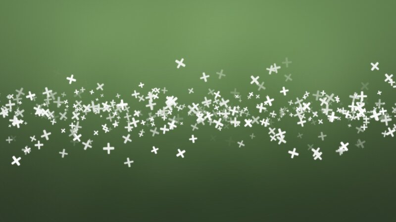 white crosses on green background