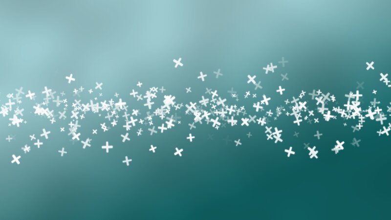 white crosses on teal background