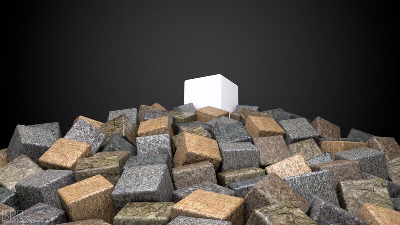 white cube among stone blocks