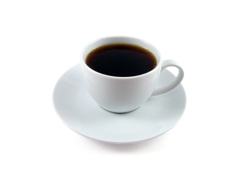 white cup of black coffee