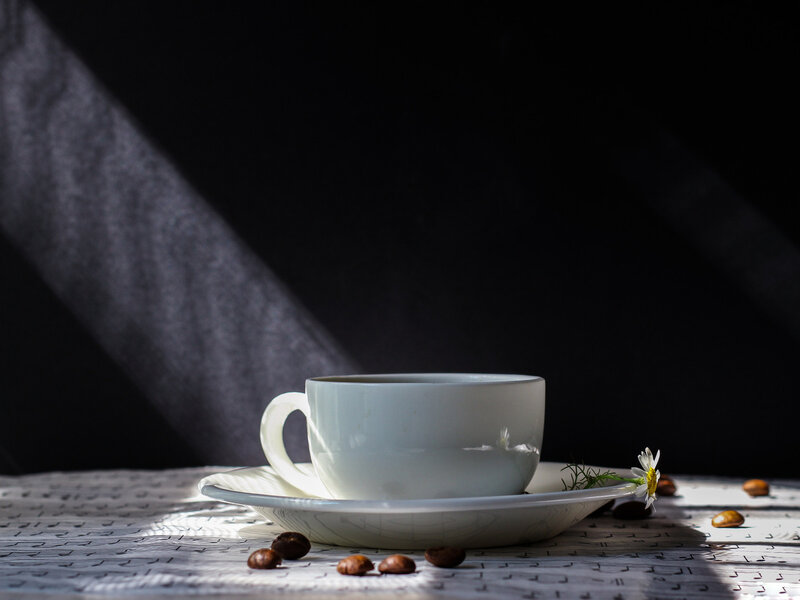 White Cup on Saucer — Dramatic