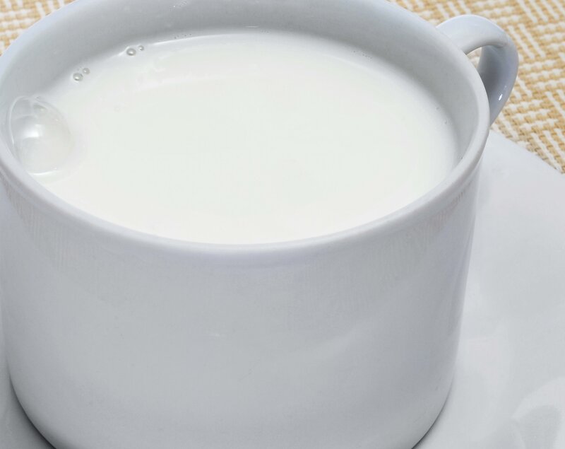white cup with milk