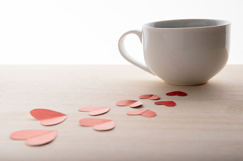 White Cup with Paper Hearts