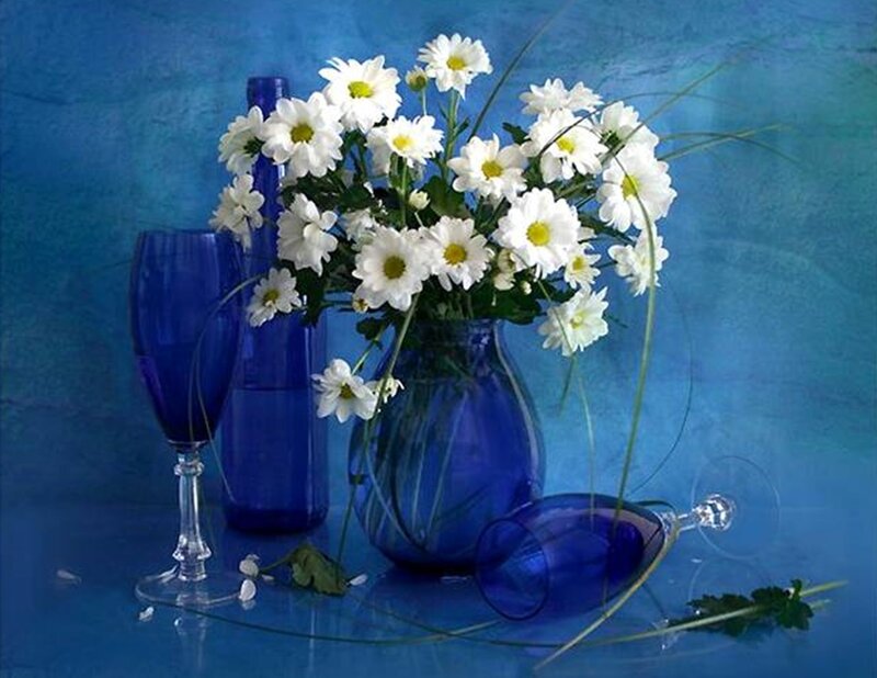 White Daisies in Blue Vase