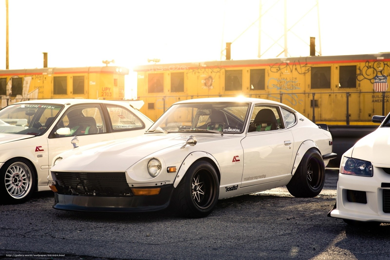 White Datsun 240Z at sunset