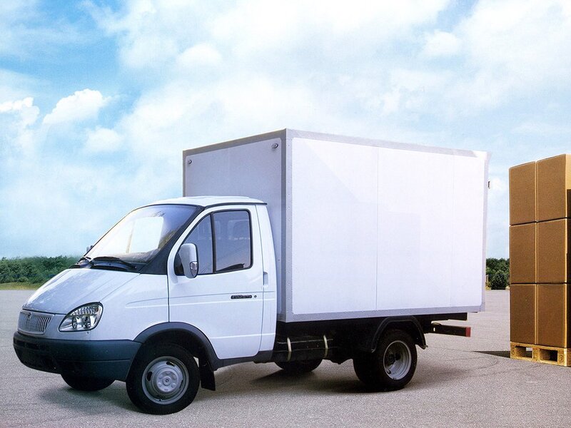 White delivery truck on tarmac