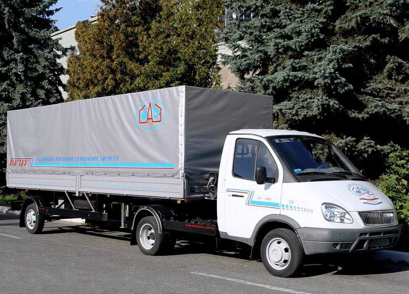 white delivery truck with tarp