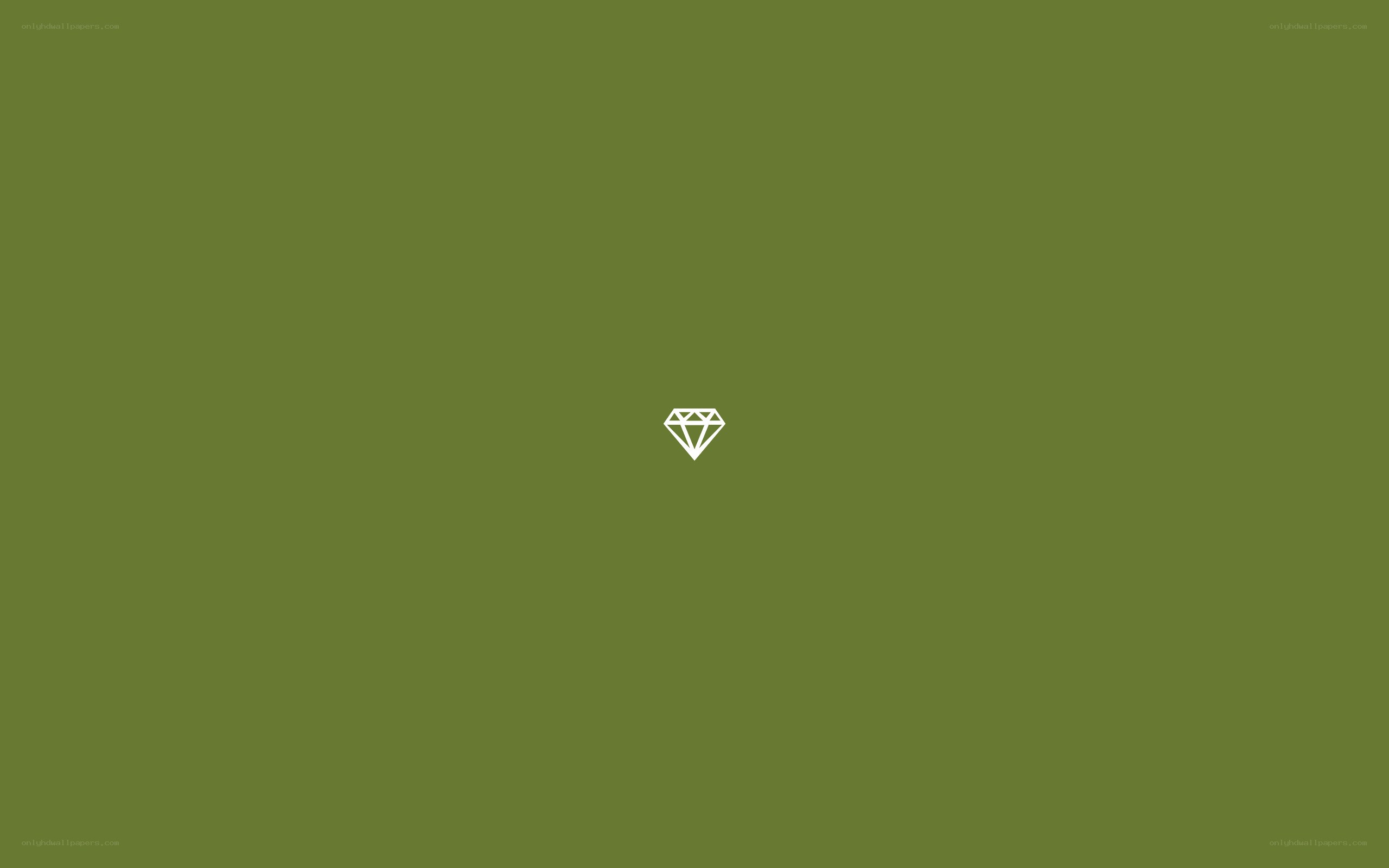 white diamond icon on green