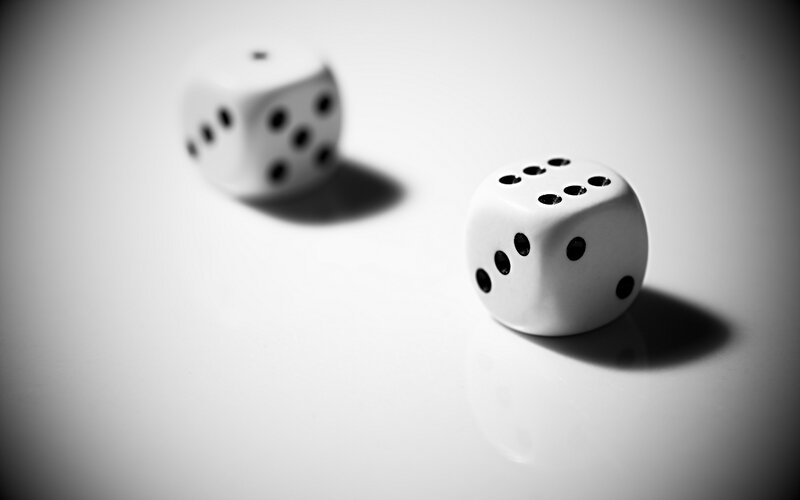 White Dice on Surface