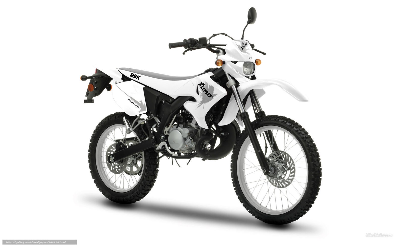 white dirt bike motorcycle
