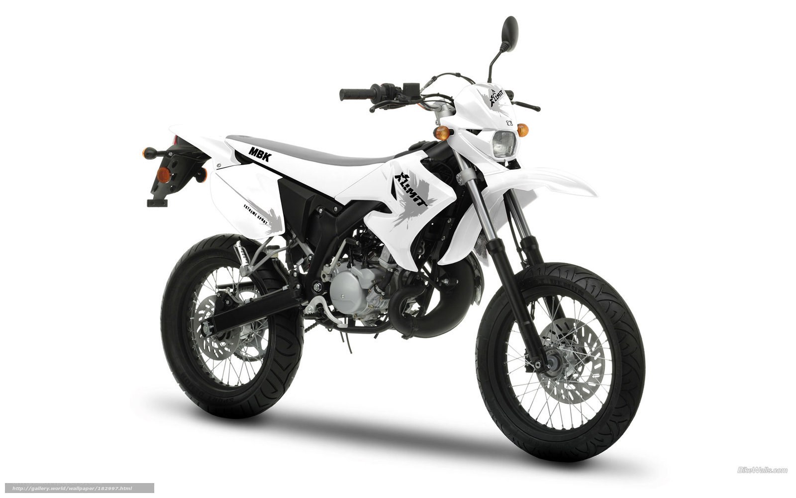 white dirt bike motorcycle