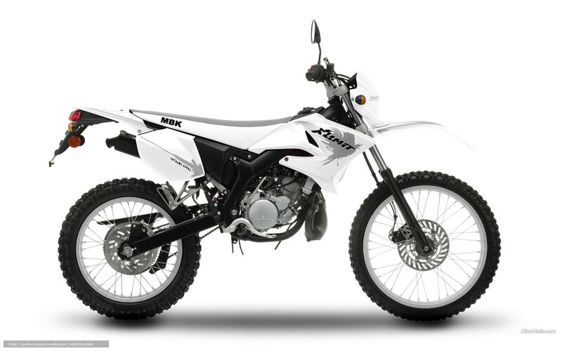 white dirt bike motorcycle