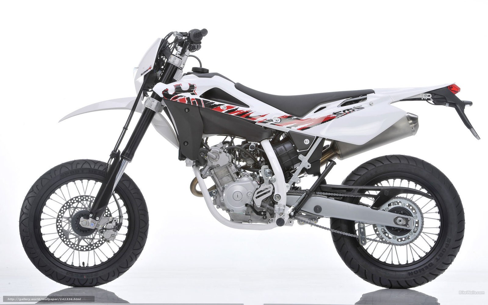 white dirt bike motorcycle