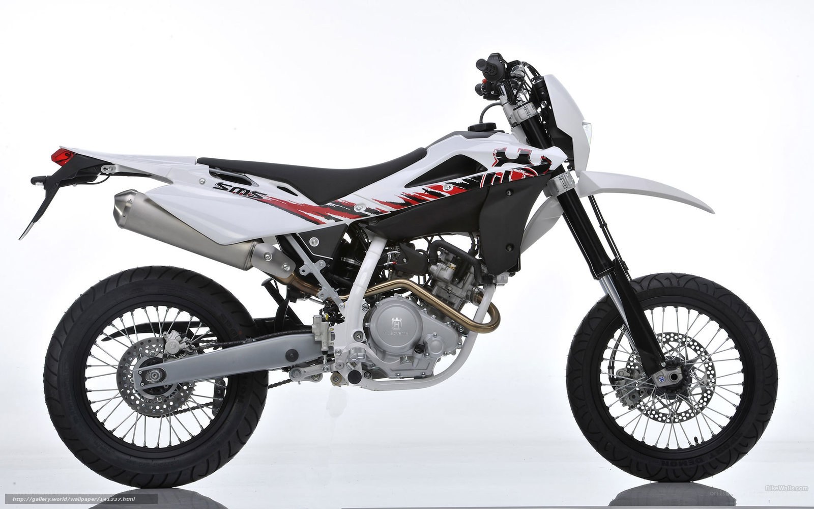 white dirt bike motorcycle